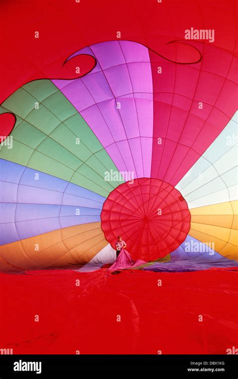 S MAN STANDING INSIDE HOT AIR BALLOON BEING INFLATED Stock Photo Alamy