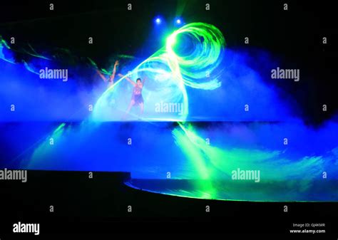 a laser light effect in a performance Stock Photo - Alamy