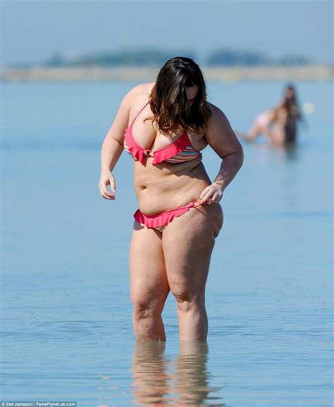 Chanelle Hayes Squeezes Her Ample Assets Into A Frilly Pink Bikini In
