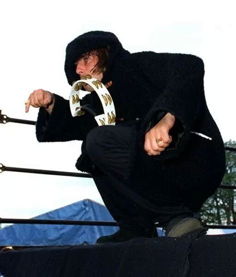 Prints Of Liam Gallagher Playing The Tambourine During The Oasis