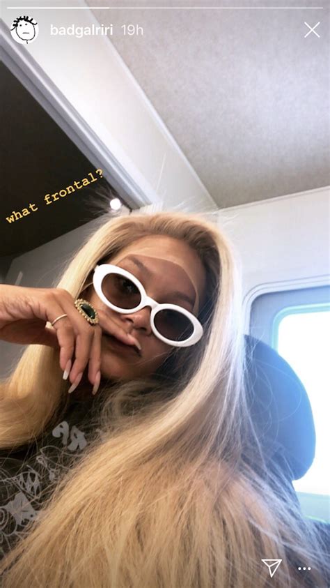 Rihanna Long Blonde Hair Side Part