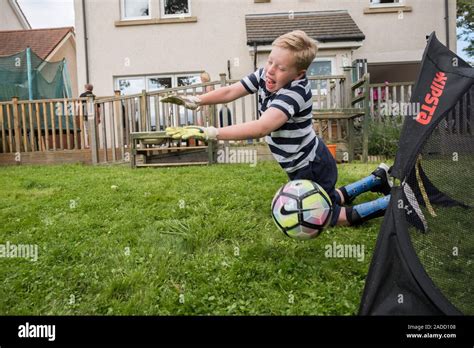 Boy with cerebral palsy. 10-year-old boy with cerebral palsy playing ...