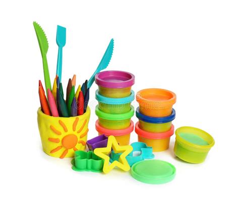 Set Of Bright Play Dough With Tools And Colorful Pencils On White