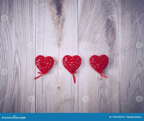 Three Red Carved Hearts On A Stick Stock Photo Image Of T