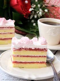 Two Pieces Of Cake Sitting On Top Of White Plates Next To A Cup Of Coffee