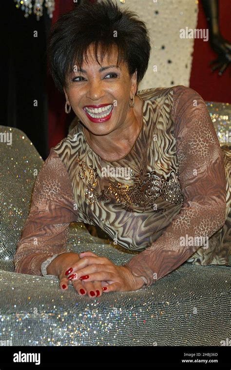 Dame Shirley Bassey Photocall For Fifty Years Of Glittering Gowns A Gala Charity Auction At