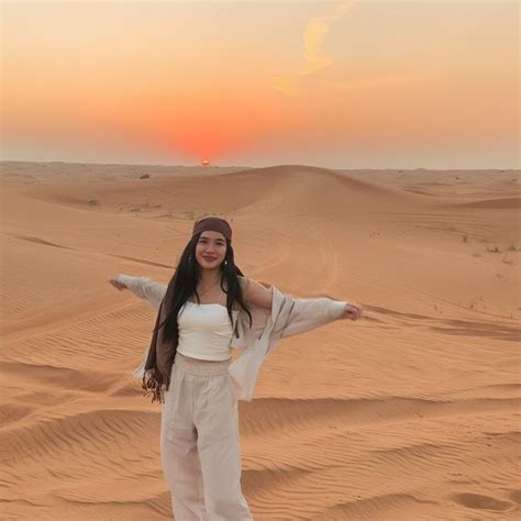 Bini Aiah Pretty Brunette Twitter Cover Photo Beach Outfit