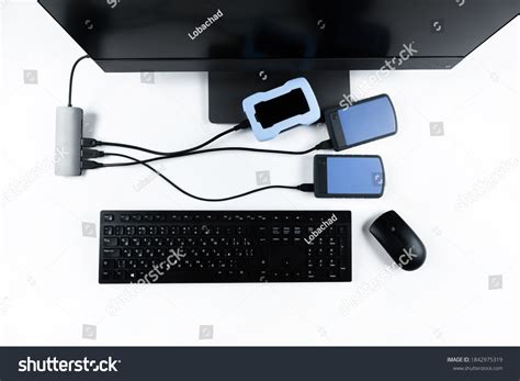 multiple external hard drives connected monoblock stock photo
