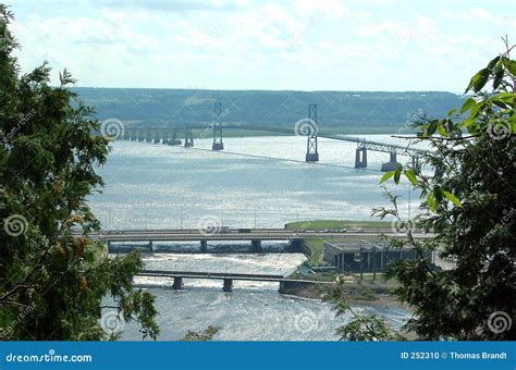 Bridge To Ile DOrleans from Montreal Stock Photo - Image of cloudy ...