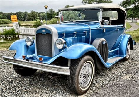 1931 FORD 2 DR MODEL A PHAETON REPLICA BY GLASSIC