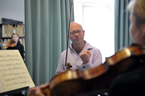 londons royal college suspends  head  strings  alleged misconduct