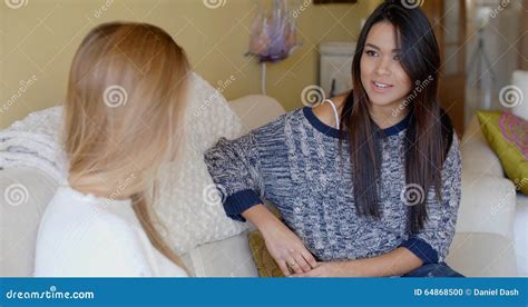 Two Young Girlfriends Sharing Their News Stock Photo Image Of Women