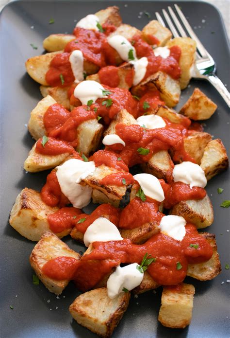 Baked Patatas Bravas Spanish Potatoes The Delicious Plate