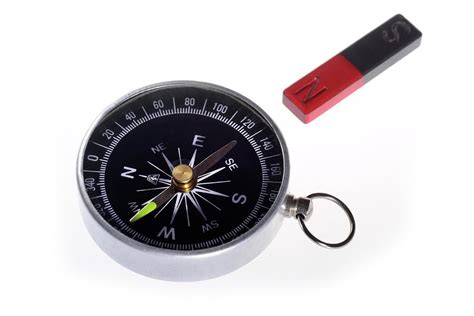 Compass And Magnet Photograph by Cordelia Molloy - Pixels