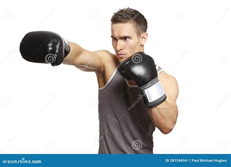 Boxeo Muscular Del Hombre Joven En Equipo De Los Deportes Foto De