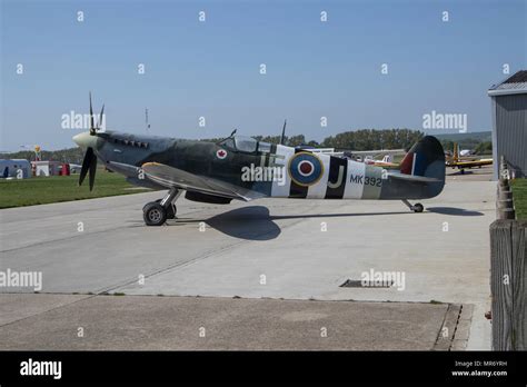 A Vintage Spitfire Mk 392 Parked At Goodwood Aerodrome At Goodwood