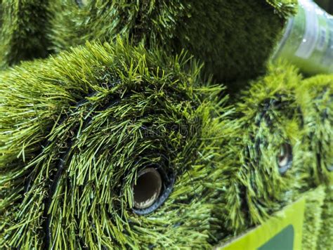 Rolls Of Artificial Grass Turf Mat For Sale At A Hardware Store Stock
