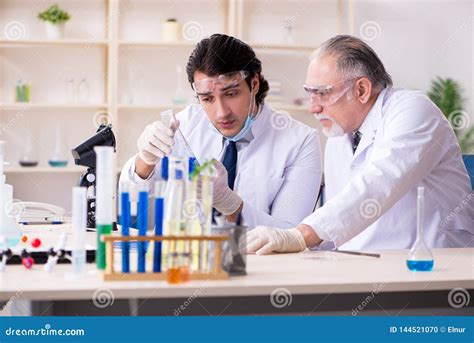 The Two Chemists Working In The Lab Stock Photo Image Of Biology