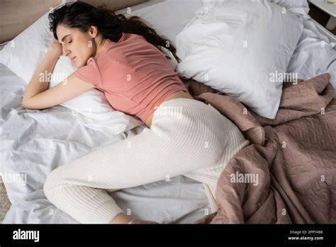 Brunette Woman Sleeping On Bed Hi Res Stock Photography And Images Alamy