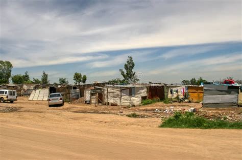 Shacks In The Slum Township In South Africa Side Of The Dirt Road