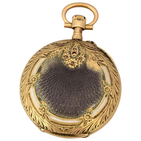 14 Karat Yellow Gold Pocket Watch Fob With B Of F L And E Medallion At