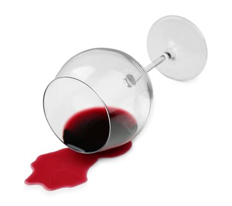 Premium Photo Overturned Glass And Spilled Wine On White Background