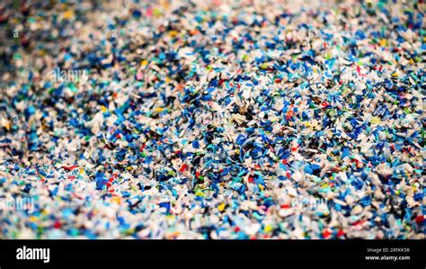 Close View Of The Multicoloured Shredded Plastic Garbage At Waste