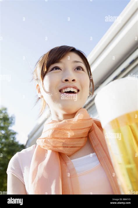 Woman Holding Beer Mug Stock Photo Alamy
