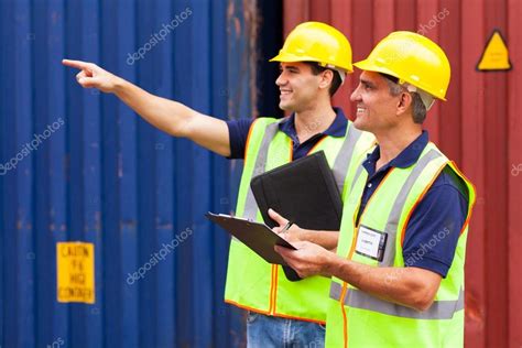 Shipping company workers working at the harbor — Stock Photo ...