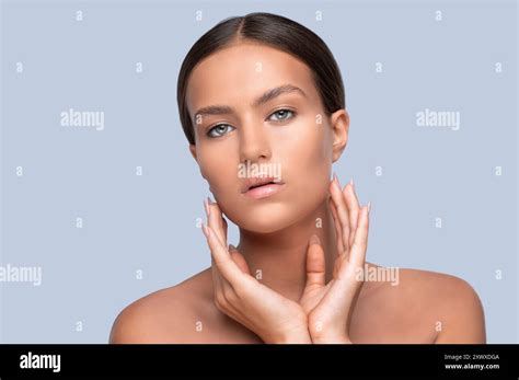 Portrait Of A Beautiful Smiling Brunette Woman With Clean Skin And