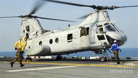 A Ch 46e Sea Knight Prepares Photograph By Stocktrek Images