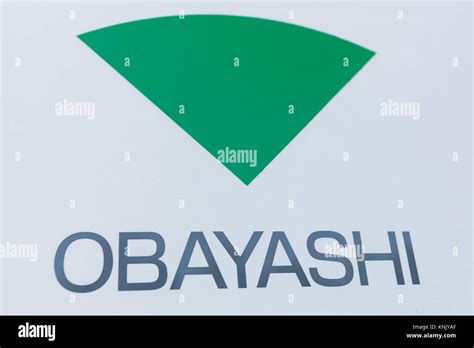 The Logo Of Obayashi Corp On Display Outside The Company Headquarters