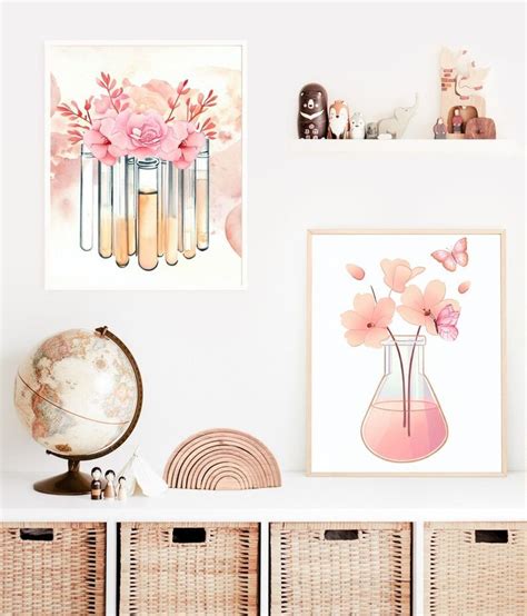 A White Shelf Topped With Baskets Filled With Pink Flowers