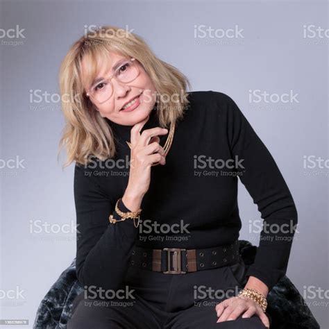 Smiling Happy Attractive 50s Middleaged Blonde Woman Senior Lady