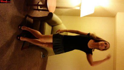 Hot Blonde Amateur In Black Dress Poses Seductively For The Camera 15 Photos