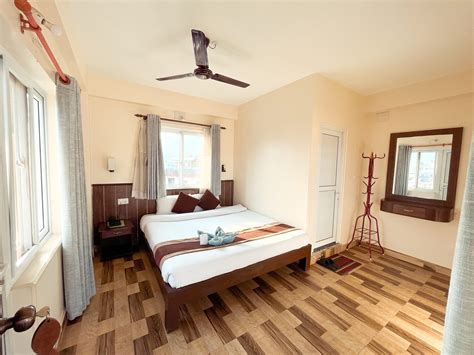 Deluxe Double Room with Private Balcony - Pokhara Tourist Home