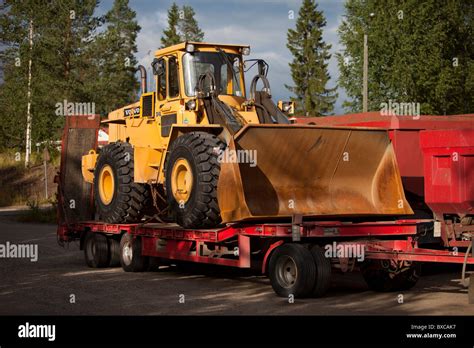 Volvo Front Loader Loaded To A Truck Trailer For Transport Finland