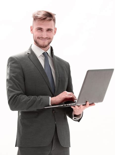 En Pleno Crecimiento Un Hombre De Negocios Con Una Computadora