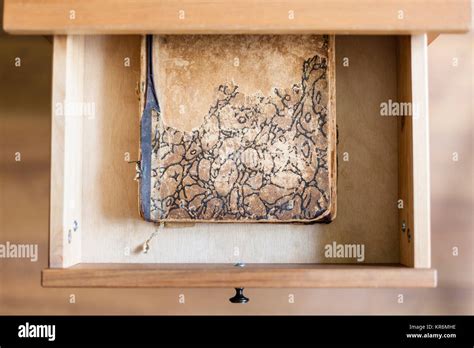 Old Book In Open Drawer Stock Photo Alamy