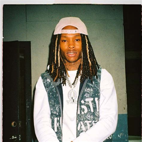 Download King Von captivates with his powerful presence | Wallpapers.com