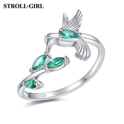 Spoo Design Offener Kolibri Ring Vogel mit grünen Zirkonia Blättern