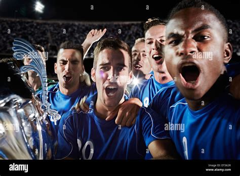 Soccer Team Cheering On Field Stock Photo Alamy