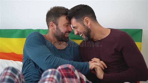 Happy Gay Couple Having Tender Moments In Bedroom Homosexual Love