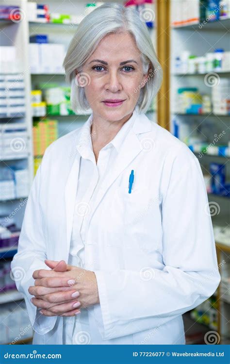 Pharmacist in lab coat stock image. Image of camera, arrangement - 77226077