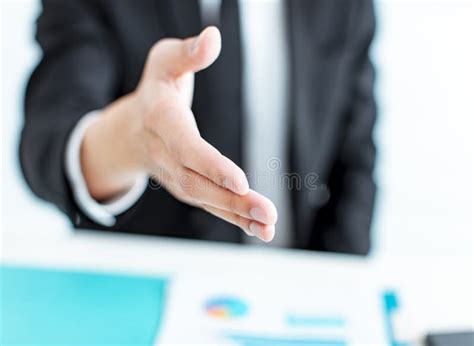 Closeup Businessman Hand Reaching Out For A Handshake Stock Image
