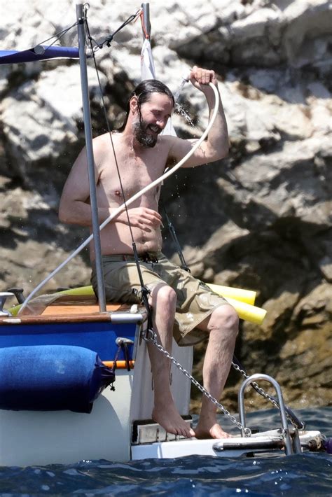 Shirtless Keanu Reeves Hoses Himself Off Sips Champagne On Boat In Italy