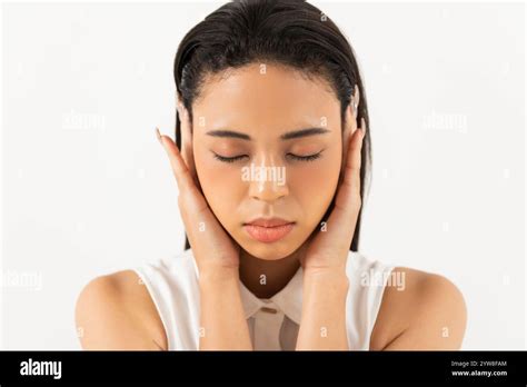Half Woman Covering Her Ear Stock Photo Alamy