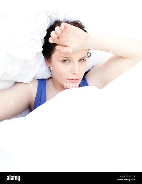 Tired woman relaxing in her bed Stock Photo - Alamy