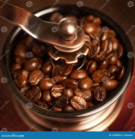 Grinding coffee beans stock image. Image of nature, bean - 15689063