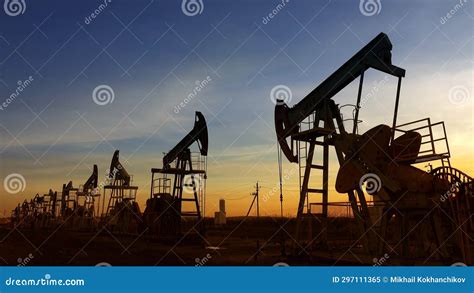 Working Oil Pumps Silhouette Against Sunset Stock Image Image Of